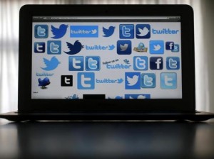 twitter multiple logos on laptop